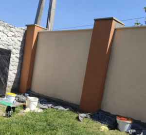 Укріплення цегляного паркану торкрет-сумішшю з гідроізоляційними добавками